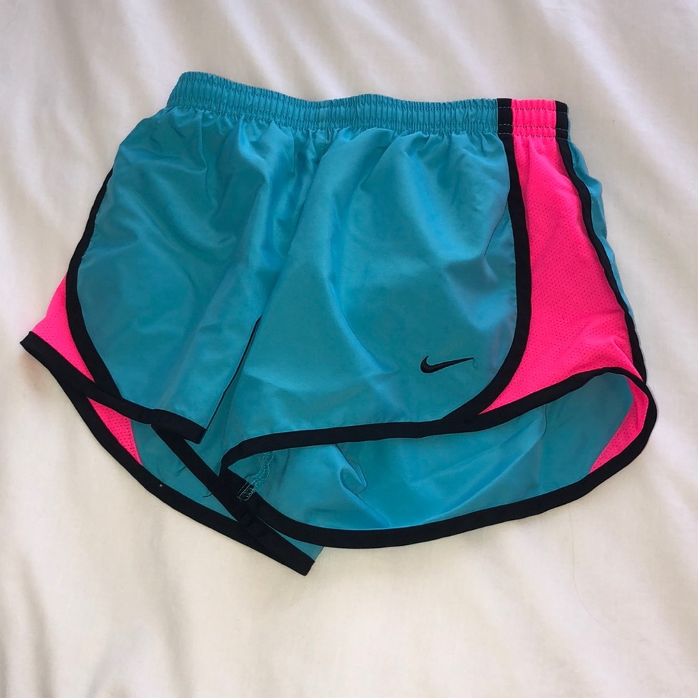 blue and pink nike running shorts